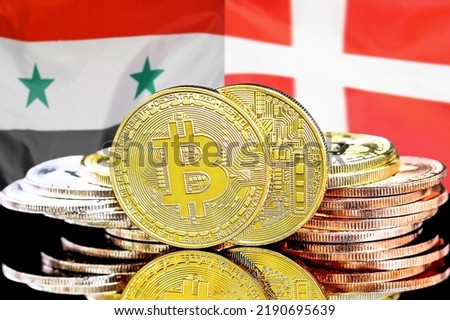Bitcoins on flag Syria and Denmark background. Concept for investors in cryptocurrency and Blockchain technology in Syria and Denmark