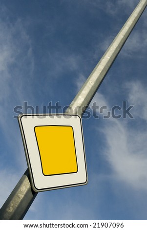 Traffic signs - the main road on blue sky background.  Concept: infinity.
