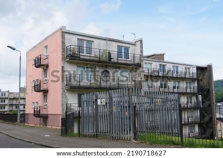 Council flats in poor housing estate with many social welfare issues in Paisley Royalty-Free Stock Photo #2190718627