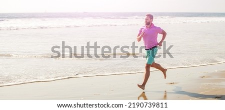 Man running and jumping, banner with copy space. energetic summer. runner feel freedom. enjoying the morning. sport athlete run fast.