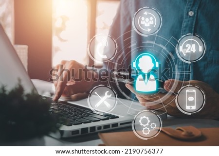 Technical support customer service concept, Person hand using smart phone with VR screen support customer icon, Technology internet concept, it support, call center and customer service help. Royalty-Free Stock Photo #2190756377