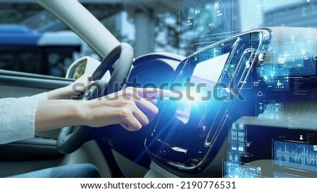 Interior of autonomous car. Driverless vehicle. Driving assist system. HUD (Heads up display). Royalty-Free Stock Photo #2190776531