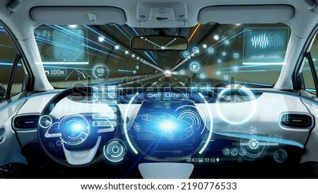 Interior of autonomous car. Driverless vehicle. Driving assist system. HUD (Heads up display). Royalty-Free Stock Photo #2190776533