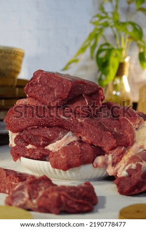 Fresh raw beef on the table, selective focus