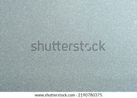 Silver panel with some fine grain in it. Silver glitter background