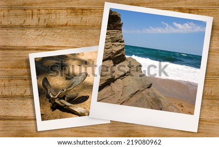 Pictures of seascape and ship anchor on background of wooden boards