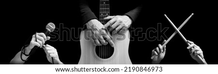 black and white singer, guitarist, drummer hands. isolated on black. music background Royalty-Free Stock Photo #2190846973
