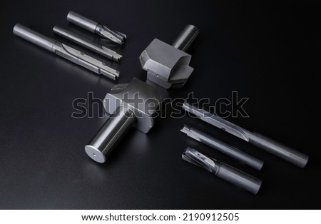 Professional cutting tools set. drill, burnishing, reamer oil hole, end mill. material carbide,Polycrystalline Diamond, steel. For use with metalwork. for CNC milling machine. on dark background. Royalty-Free Stock Photo #2190912505