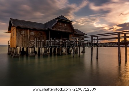 Boathouse at a lake in Bavaria Royalty-Free Stock Photo #2190912509