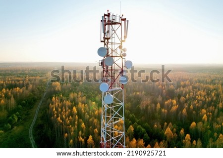 Mobile Tower installation. Cell site and Telecom Base Station. 5G internet online generation. Health Hazards Caused By Mobile Tower Radiation. Telecommunications and Wireless network. Wifi antenna. Royalty-Free Stock Photo #2190925721
