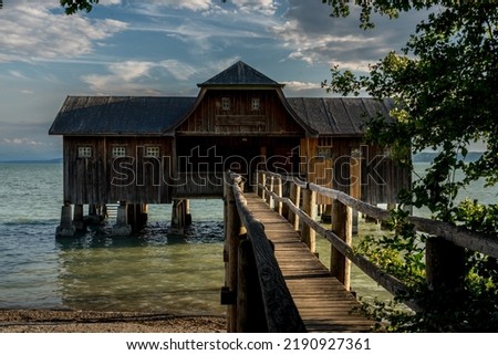 Wodden Boathouse at al lake in Bavaria Royalty-Free Stock Photo #2190927361