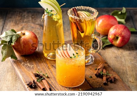 Variety of fall cocktails or mocktails made with apple cider, Thanksgiving drinks ideas