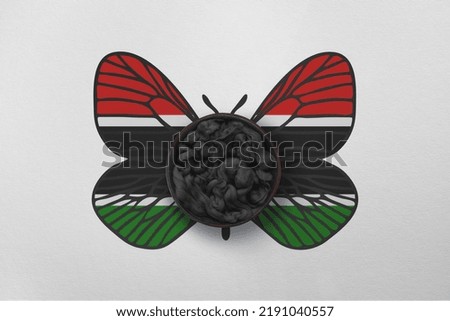 Patriotic background with butterfly wings in colors of national flag. Photography and marketing digital backdrop. Kenya
