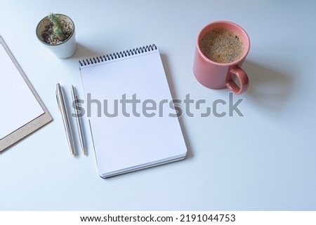 isolated on white background,notebook,pens,coffee and clipboard.
business finance concept.new year plan and goal concept.