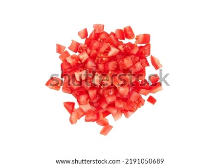 Sliced fresh raw red tomato, cubes, heap, isolated on white background, top view, close-up Royalty-Free Stock Photo #2191050689