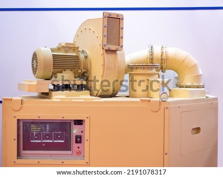 Industrial equipment. Large-sized metal machine screen control. Digital screen covered with protective glass. Industrial equipment in beige color. Concept heavy production. Sale industrial equipment