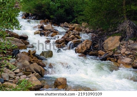 White Water Rushing Through Granite Royalty-Free Stock Photo #2191090109