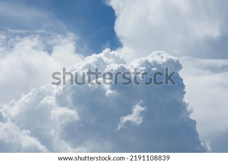 Blue sky and beautiful white clouds for background uses. Amazing. Background and wallpaper.