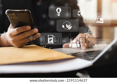 Business man using computer on CO2 emission reduction concept with global warming icon. along with climate, energy, sustainability, environment.