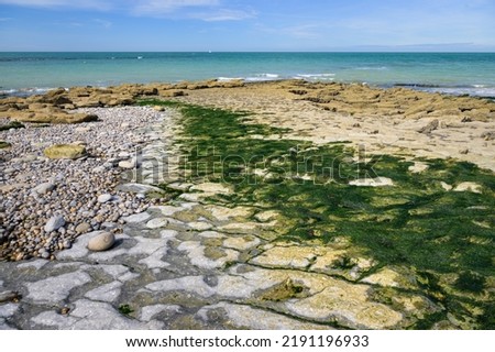 Coast near Cap Gris Nez in northern France on a calm day in summer, interesting rock formations