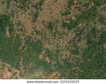 drone shot aerial view top angle mountain range hill cliff summit valley forest steep natural scenery wallpaper background india tamilnadu tourism 