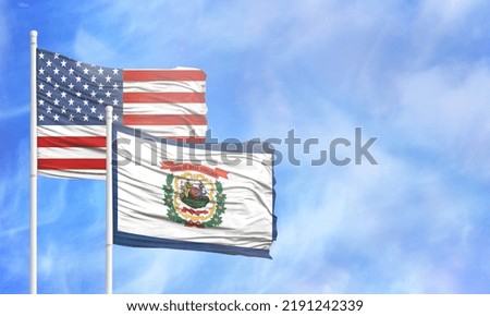 Waving American flag and flag of State of West Virginia.