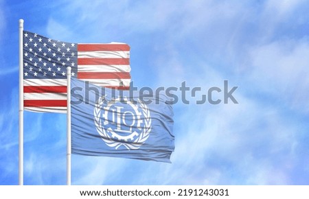 Waving American flag and flag of ILO.