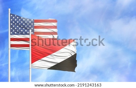 Waving American flag and flag of Sealand,Principality of.