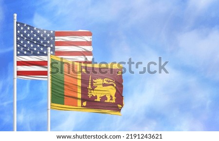 Waving American flag and flag of Sri Lanka.