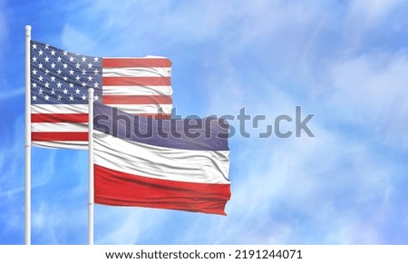 Waving American flag and flag of Los Altos.