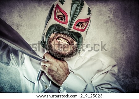 Office, aggressive executive suit and tie, Mexican wrestler mask