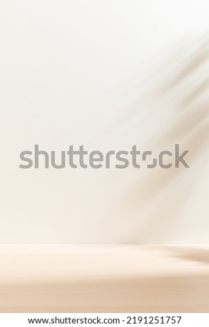 Vertical blank warm lighting background. White and Wooden surface. Light and Shadow wallpaper. Space for text. Backdrop. Studio photography. 