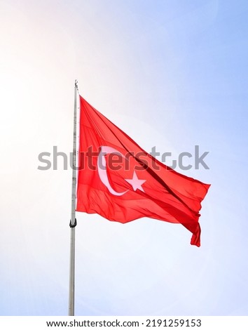 Flag of Turkey, Turkish flag on a flagpole on clean blue sky and sunny background