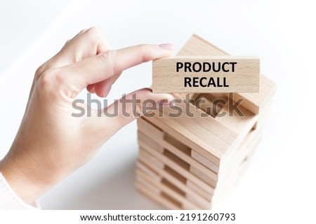 Product Recall written on a wooden block
