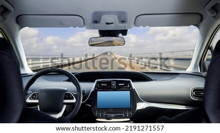 Interior of autonomous car. Driverless vehicle. Driving assist system. Royalty-Free Stock Photo #2191271557