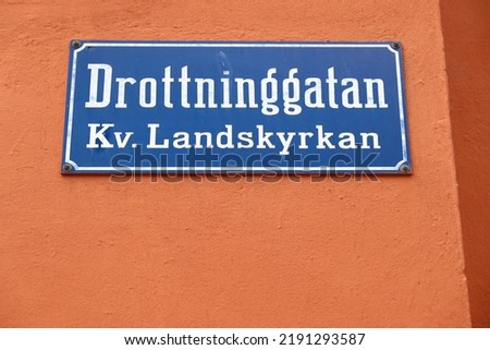 Norrkoping town in Sweden. Drottninggatan street name sign.