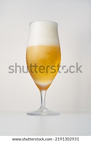 refreshing cold beer glasses on white background