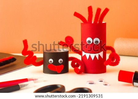 Halloween craft. Handmade decoration cute funny monster. Drawing Handmade toys. Reuse concept