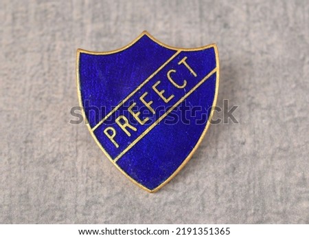 School Prefect
Vintage enamel pin  badge 1960s  Royalty-Free Stock Photo #2191351365