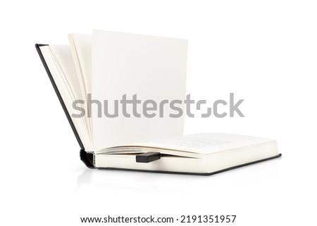 Blank open book with flash disk into it isolated on white background. E-learning concept