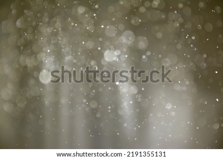 Bokeh abstract background caused by water spray