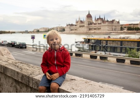 Child, boy, visiting the castle in Budapest on a summer day, Hungary