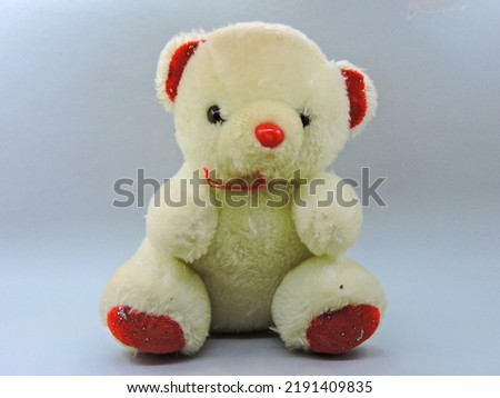 Teddy bear on a white background. Children's toy. Growing up children. Imaginary friend.