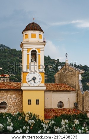 Clock tower of Church Saint Michel in France, Cote dAzur, Villefranche-sur-Mer Royalty-Free Stock Photo #2191438393
