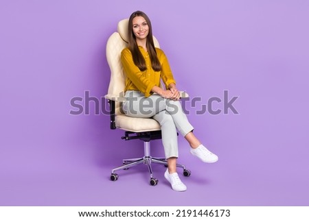 Full body photo of manager sit wear blouse trousers boots isolated on purple color background