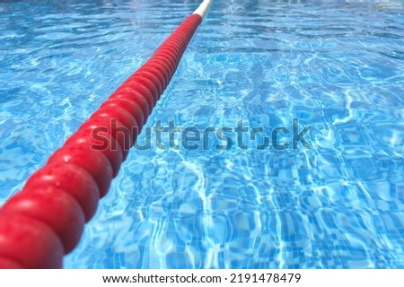detail of a beacon or buoy separating a lane in a swimming pool
