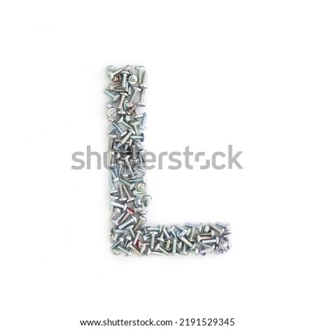 Capital letter L made from screws and bolts. Alphabet made from used screws. White background. Industrial bolt font