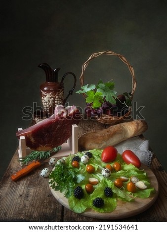 Still life with Ham on a wooden table