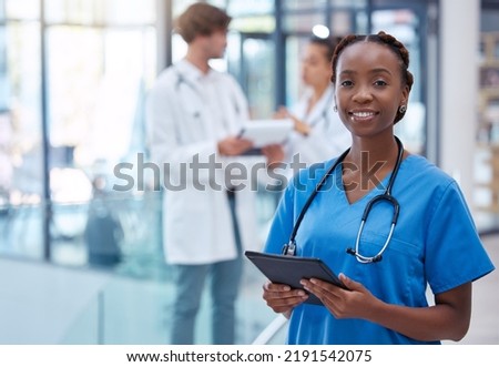 Nurse, professional and healthcare worker with tablet in medical center, clinic and hospital while analyzing test result. Portrait of frontline worker showing trust, care and knowledge about Royalty-Free Stock Photo #2191542075