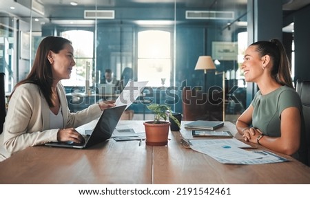 Job interview for a business woman at a hiring company talking to the HR manager about the role or position. Young female applicant or candidate in a meeting with an employer having a discussion Royalty-Free Stock Photo #2191542461